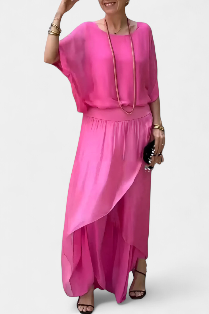 Maravilla dviejų dalių plazdantis komplektas su laisvu topu ir asimetrine sijonu