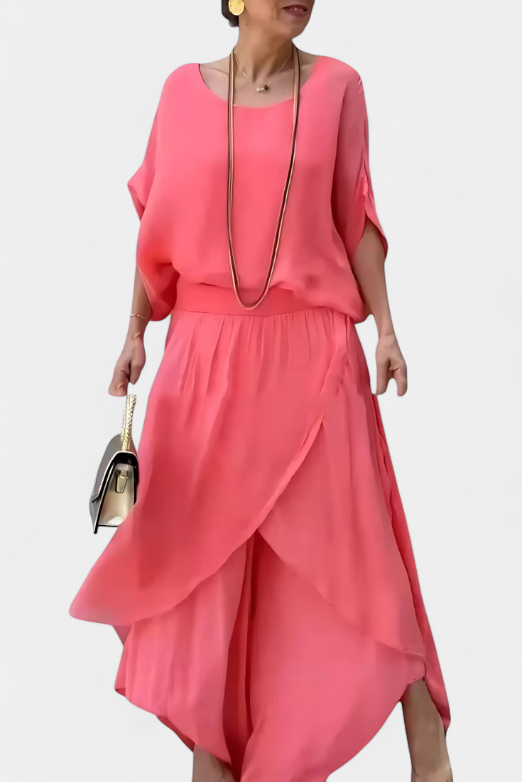 Maravilla dviejų dalių plazdantis komplektas su laisvu topu ir asimetrine sijonu