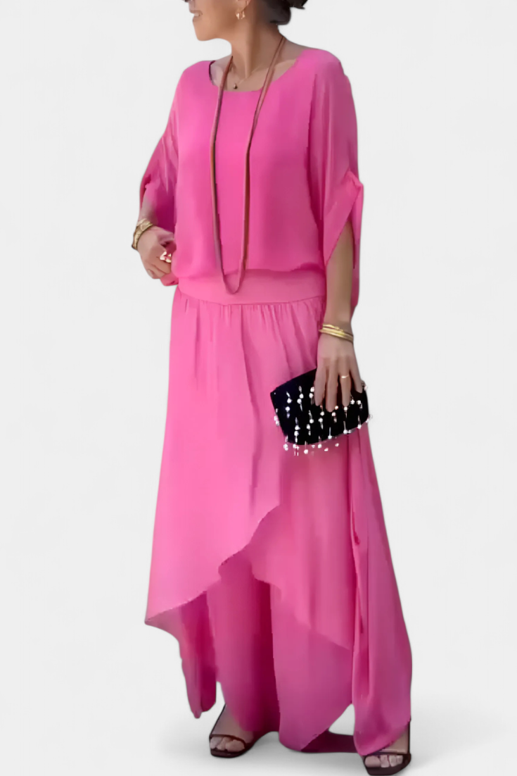 Maravilla dviejų dalių plazdantis komplektas su laisvu topu ir asimetrine sijonu