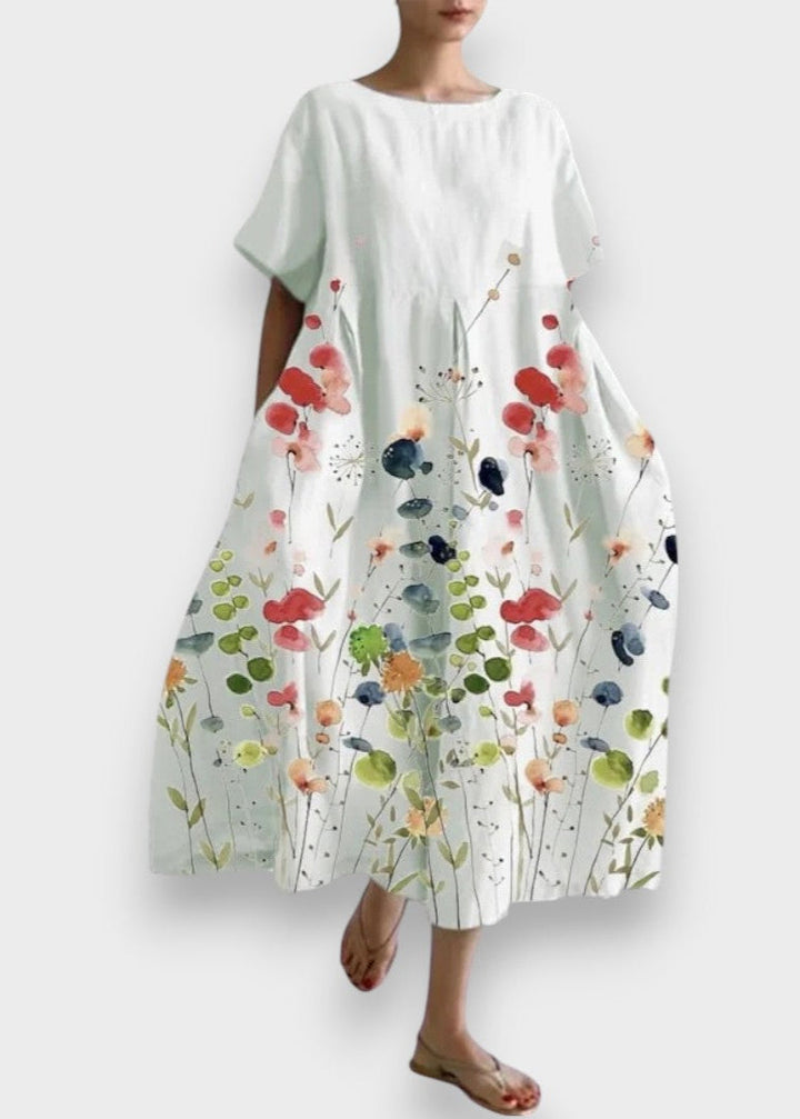 LILIANA | Ilga laisvalaikio suknelė su judėjimo laisve ir gėlių stiliumi vasaros dienoms