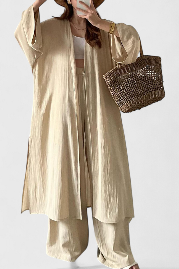 Suella dviejų dalių kasdienis komplektas su ilgu megztiniu ir šoniniu plyšiu