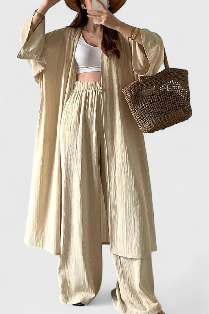 Suella dviejų dalių kasdienis komplektas su ilgu megztiniu ir šoniniu plyšiu