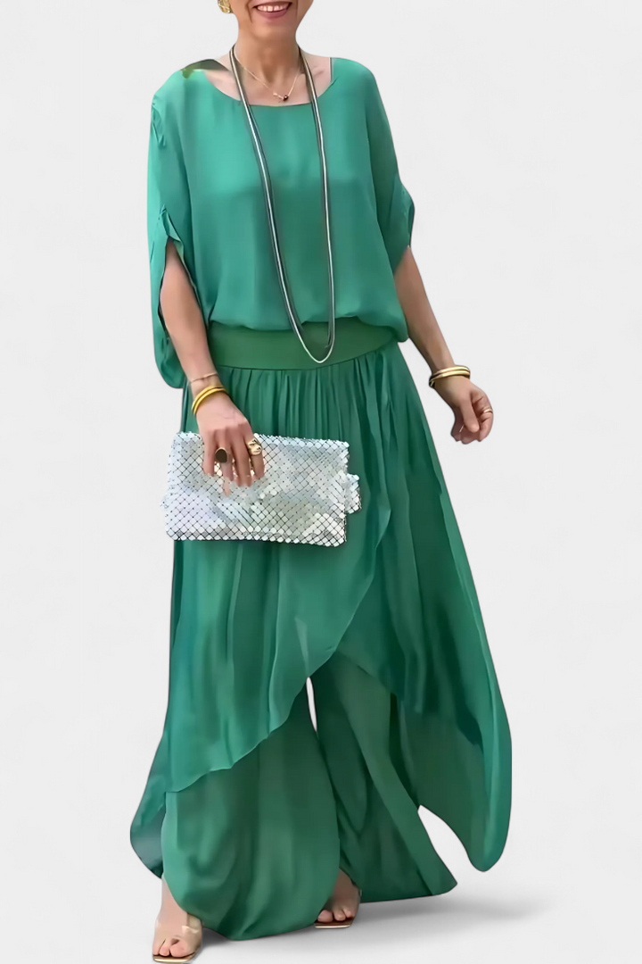 Maravilla dviejų dalių plazdantis komplektas su laisvu topu ir asimetrine sijonu